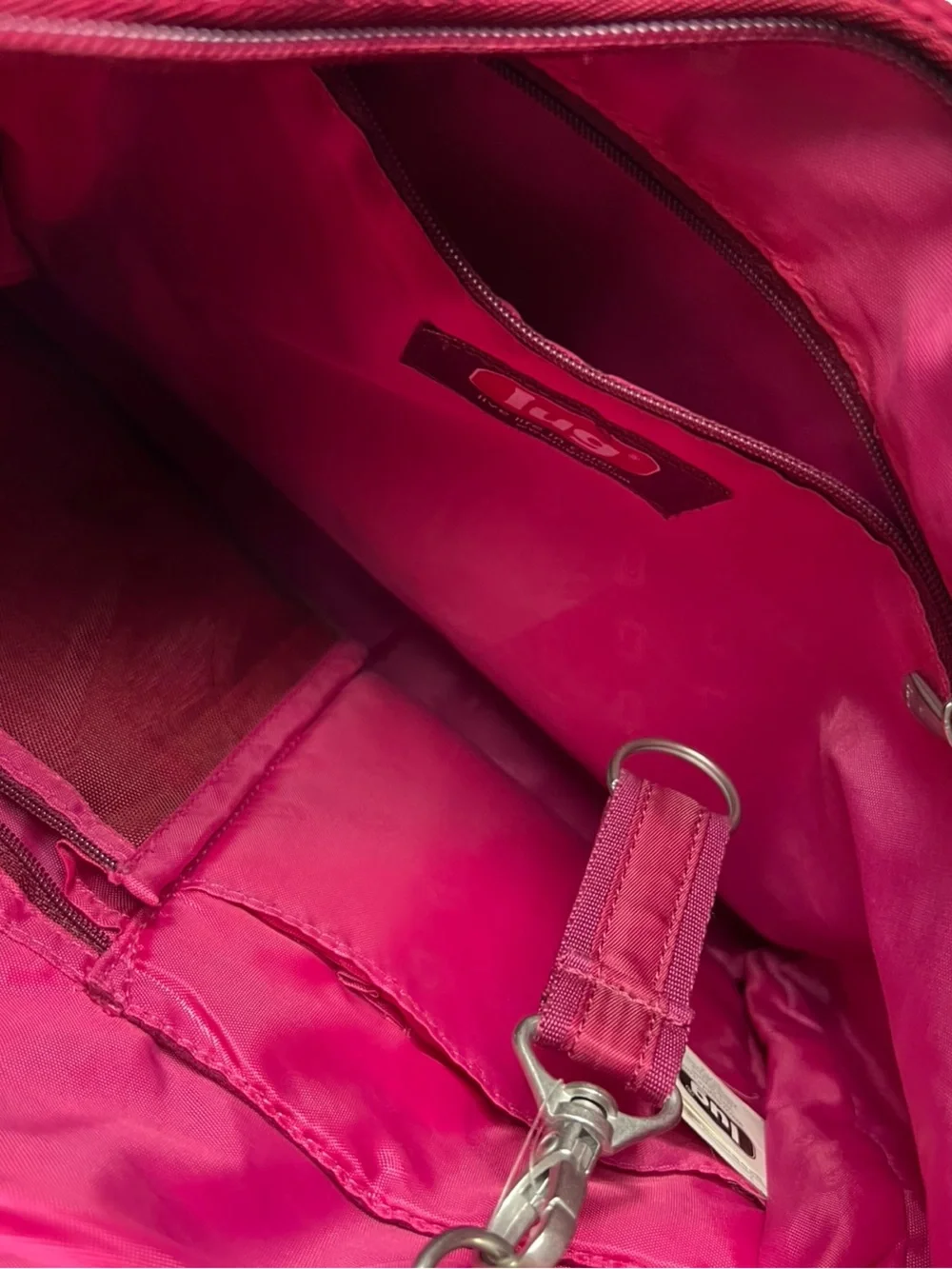 Lug Magenta Travel Crossbody Bag Hidden Water Bottle Pocket Organizer Purse